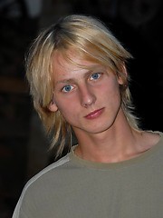 Naked blonde teen boy posing in the garden