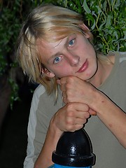 Naked blonde teen boy posing in the garden