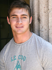 Strong blue-eyed straight jock solo posing
