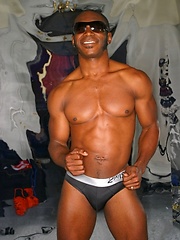 Black muscle guy shows his strong body and long cock