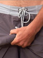 His cock is rock hard as he uses both hands to fist his fat 8 inch cock