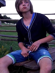 Emo boy toying in the evening