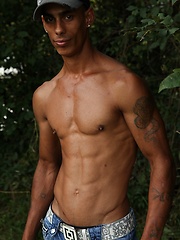 Bronzed guy shows his beefy body